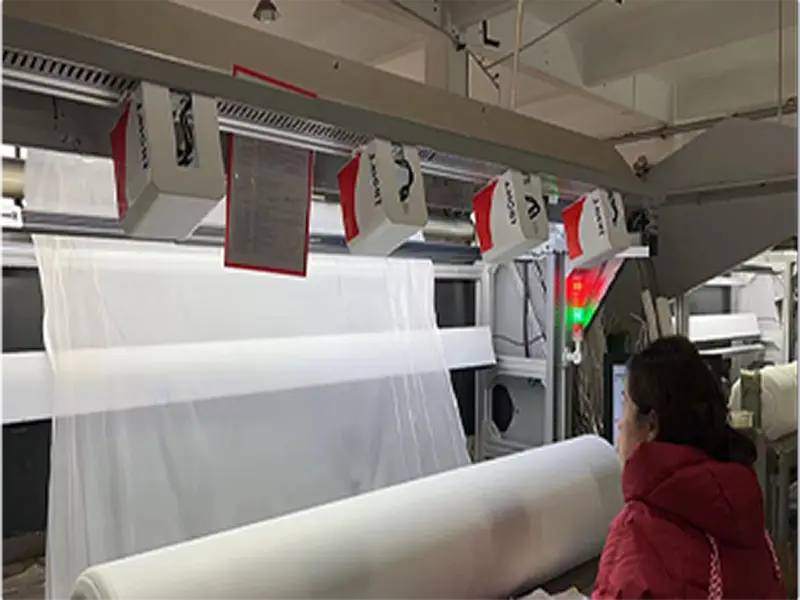 Fabric laminating process machine in textile factory