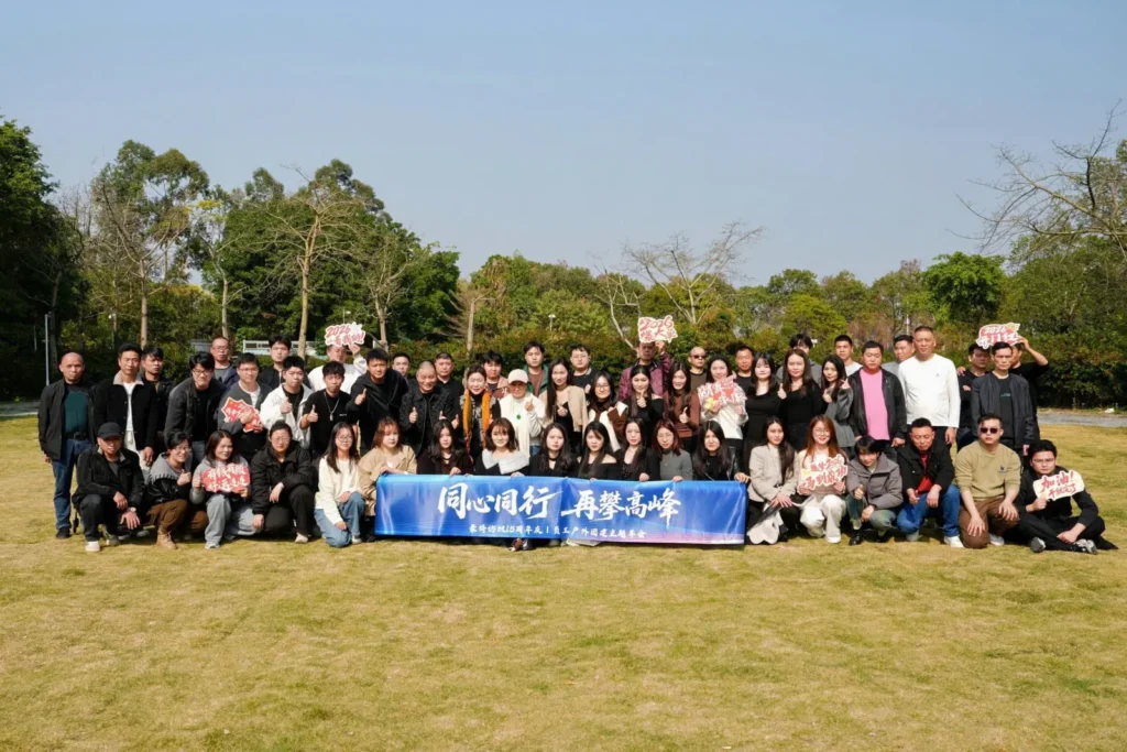 Company team group photo at outdoor event