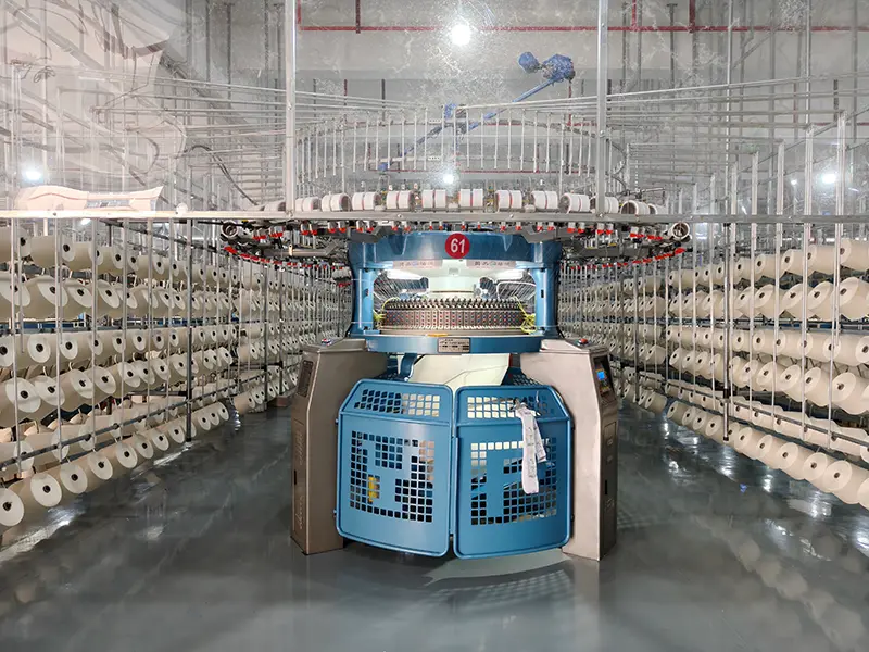 Large circular knitting machine used for bulk fabric production at MUYUE Textile factory